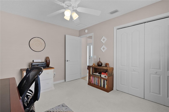 2738 Morven Park Way, The Villages, FL 32162 - office featuring light colored carpet, ceiling fan, a textured ceiling, and baseboards