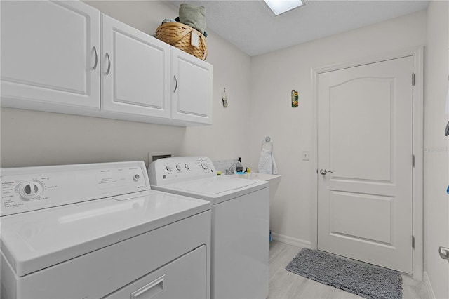 2738 Morven Park Way, The Villages, FL 32162 - laundry area with washer and clothes dryer, cabinet space, and baseboards