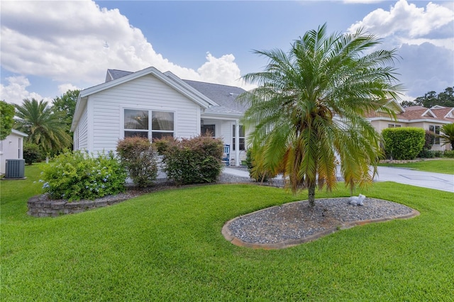 2738 Morven Park Way, The Villages, FL 32162 - view of front of property featuring a front lawn and cooling unit