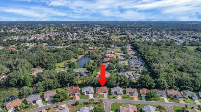 2766 Privada Dr, The Villages, FL 32162 - aerial view of property and surrounding area featuring nearby suburban area and a large body of water