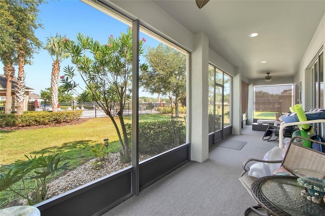 11601 Thacker Dr, Clermont, FL 34711 - sunroom featuring carpet flooring, ceiling fan, and recessed lighting