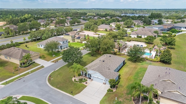11601 Thacker Dr, Clermont, FL 34711 - aerial perspective of suburban area with a pool area