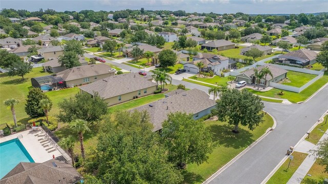 11601 Thacker Dr, Clermont, FL 34711 - aerial perspective of suburban area featuring a pool area