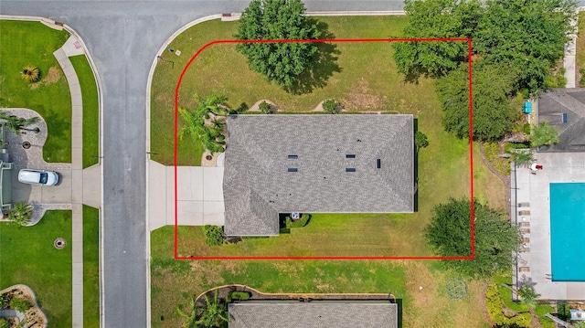11601 Thacker Dr, Clermont, FL 34711 - aerial view of property and surrounding area featuring a pool area and property parcel outlined