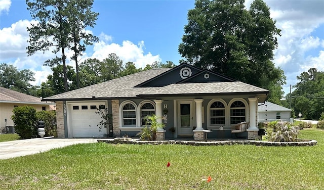 5051 NW 61st Ct, Ocala, FL 34482 - view of front of home featuring covered porch, concrete driveway, a garage, a front yard, and roof with shingles
