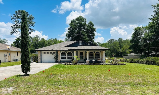5051 NW 61st Ct, Ocala, FL 34482 - view of front facade with an attached garage, concrete driveway, a porch, central AC unit, and a shingled roof