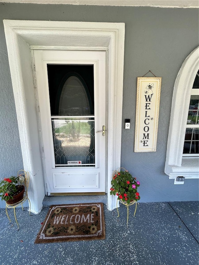 5051 NW 61st Ct, Ocala, FL 34482 - entrance to property featuring stucco siding