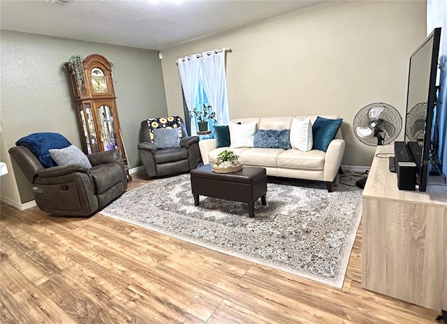 5051 NW 61st Ct, Ocala, FL 34482 - living room with wood finished floors and baseboards
