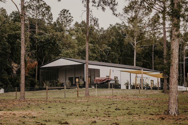 18142 Powerline Rd, Dade City, FL 33523 - view of outbuilding featuring a view of trees