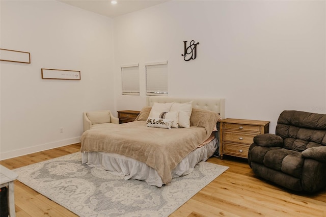 18142 Powerline Rd, Dade City, FL 33523 - bedroom featuring baseboards and light wood-style flooring