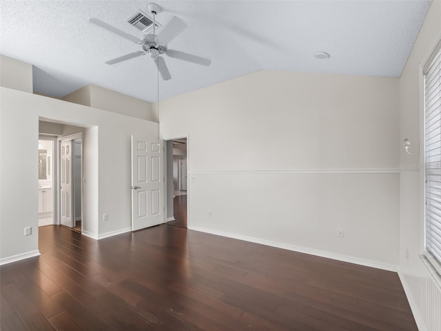 628 San Pedro Dr, The Villages, FL 32159 - unfurnished bedroom featuring wood finished floors, lofted ceiling, and ceiling fan
