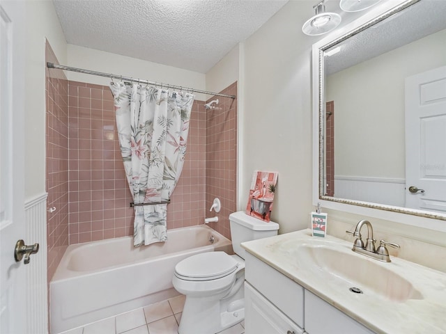 628 San Pedro Dr, The Villages, FL 32159 - bathroom featuring shower / tub combo with curtain, vanity, a textured ceiling, and tile patterned flooring