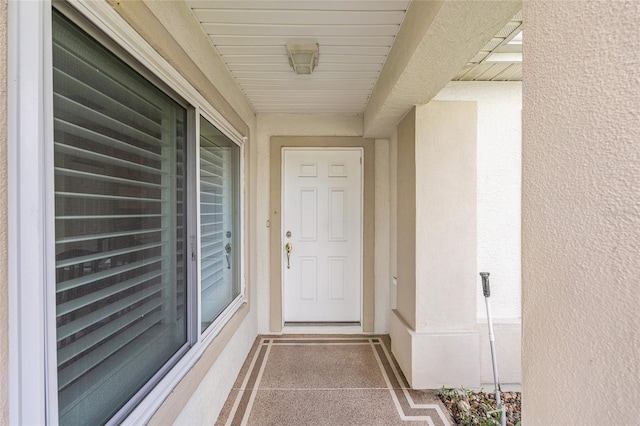 13643 SE 89th Ct, Summerfield, FL 34491 - property entrance with stucco siding