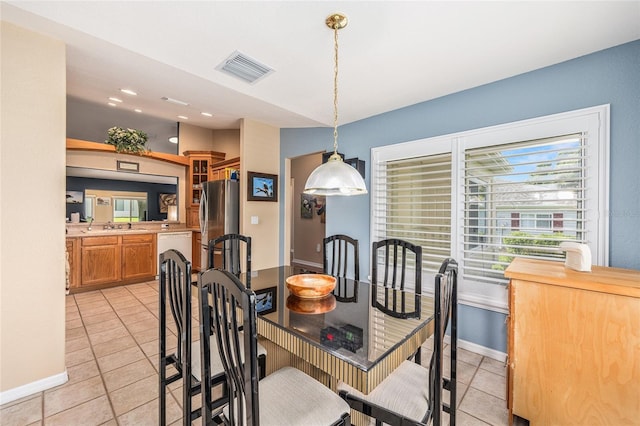 13643 SE 89th Ct, Summerfield, FL 34491 - dining room featuring light tile patterned flooring, baseboards, and recessed lighting