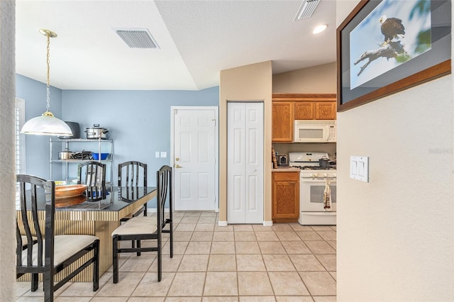 13643 SE 89th Ct, Summerfield, FL 34491 - dining space featuring light tile patterned floors