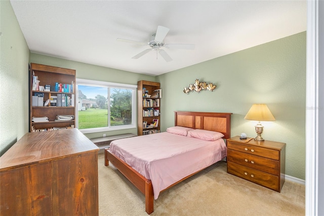 13643 SE 89th Ct, Summerfield, FL 34491 - carpeted bedroom with a ceiling fan