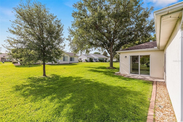 13643 SE 89th Ct, Summerfield, FL 34491 - view of grassy yard featuring a residential view