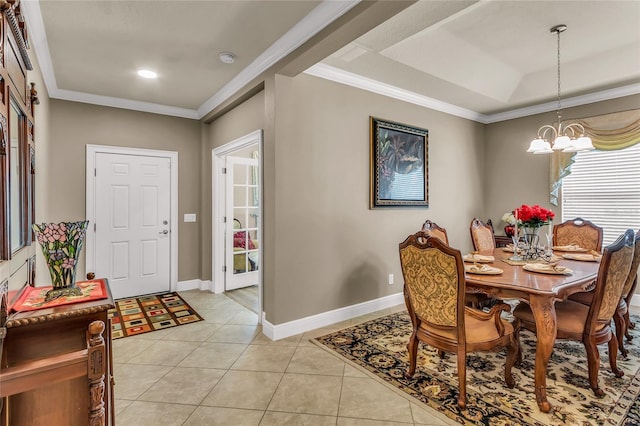 3222 San Leo Dr, Orlando, FL 32820 - dining area with a chandelier, ornamental molding, light tile patterned floors, a raised ceiling, and baseboards