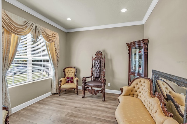 3222 San Leo Dr, Orlando, FL 32820 - sitting room featuring crown molding, baseboards, light wood-type flooring, and recessed lighting