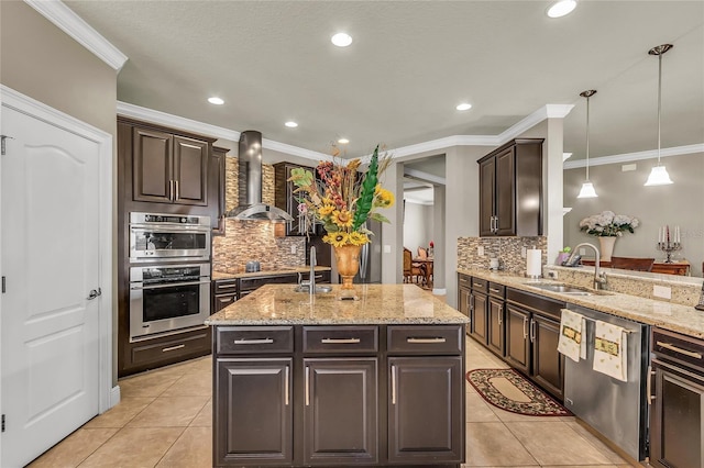 3222 San Leo Dr, Orlando, FL 32820 - kitchen featuring appliances with stainless steel finishes, a sink, light tile patterned floors, wall chimney range hood, and tasteful backsplash