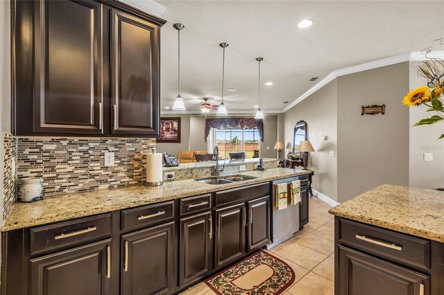 3222 San Leo Dr, Orlando, FL 32820 - kitchen with stainless steel dishwasher, a sink, backsplash, crown molding, and light tile patterned flooring