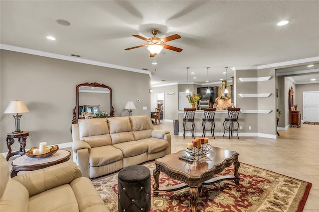 3222 San Leo Dr, Orlando, FL 32820 - living room with ceiling fan, crown molding, light tile patterned flooring, recessed lighting, and baseboards