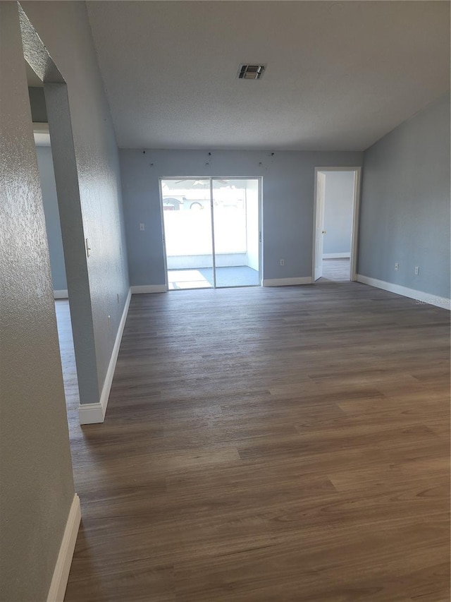 112 Arlington Ct, Haines City, FL 33844 - empty room with baseboards and wood finished floors