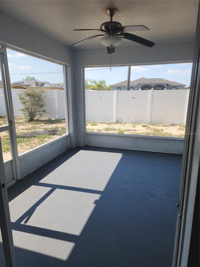 112 Arlington Ct, Haines City, FL 33844 - unfurnished sunroom with ceiling fan