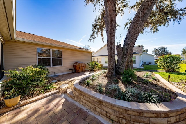 9430 SE 176th Saffold St, The Villages, FL 32162 - view of yard with a patio