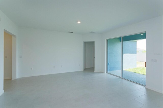 520 Silver Palm Dr, Haines City, FL 33844 - spare room with recessed lighting