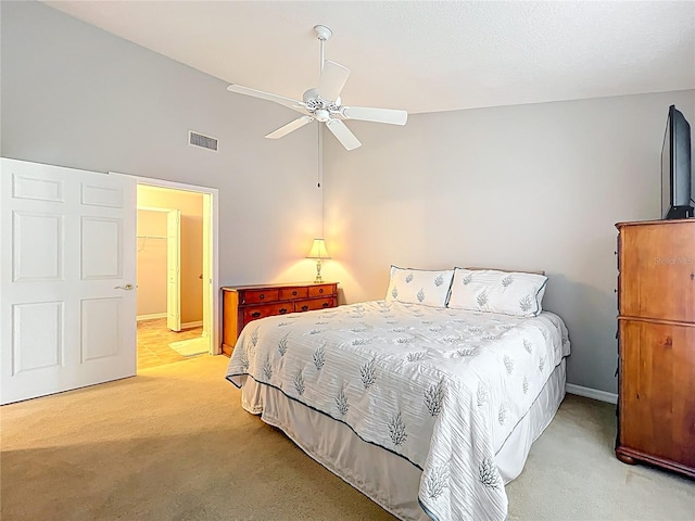 264 Juniper Way, Tavares, FL 32778 - bedroom with light carpet, high vaulted ceiling, baseboards, and a ceiling fan