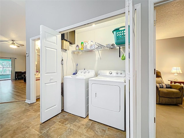 264 Juniper Way, Tavares, FL 32778 - laundry room with independent washer and dryer, ceiling fan, light stone finish flooring, and a textured ceiling