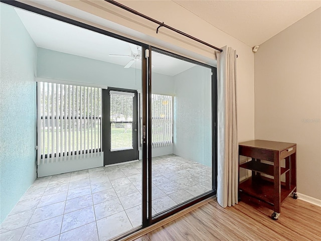 264 Juniper Way, Tavares, FL 32778 - entryway with a ceiling fan and wood finished floors