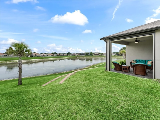 17108 SE 111th Terrace Rd, Summerfield, FL 34491 - view of green lawn featuring a water view and ceiling fan