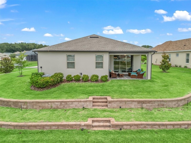 17108 SE 111th Terrace Rd, Summerfield, FL 34491 - rear view of house with stucco siding, a patio area, a lawn, and roof with shingles