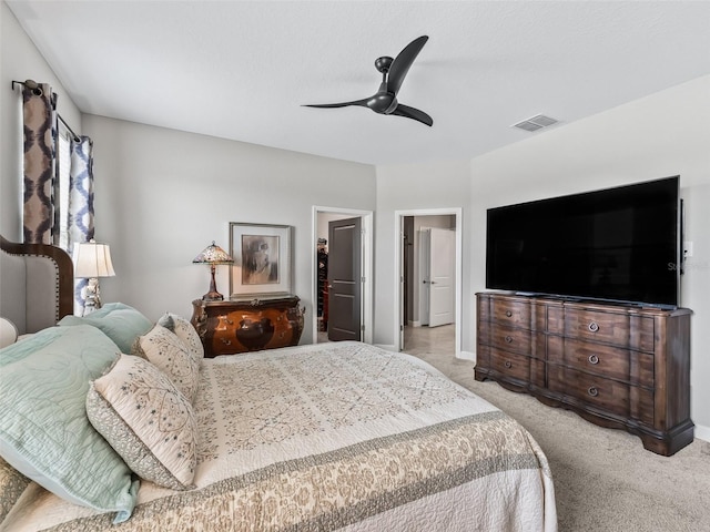 17108 SE 111th Terrace Rd, Summerfield, FL 34491 - carpeted bedroom featuring a spacious closet, a ceiling fan, and baseboards