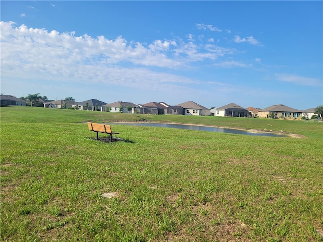 17108 SE 111th Terrace Rd, Summerfield, FL 34491 - view of grassy yard featuring a residential view and a water view
