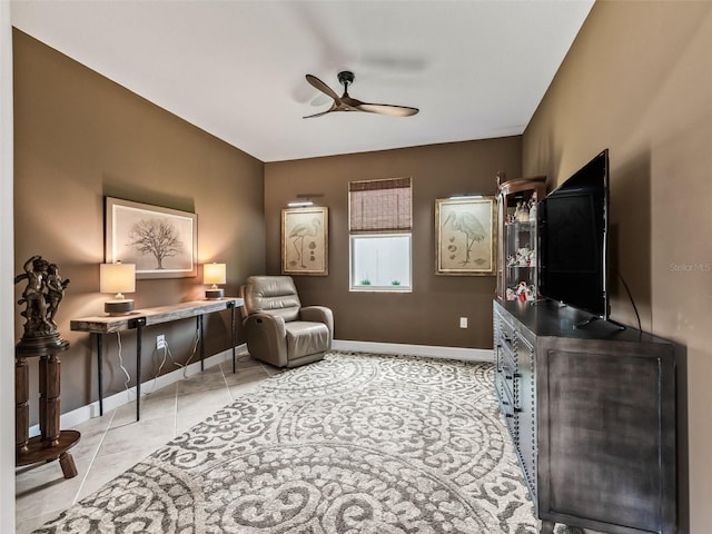 17108 SE 111th Terrace Rd, Summerfield, FL 34491 - sitting room with a ceiling fan, baseboards, and light tile patterned floors