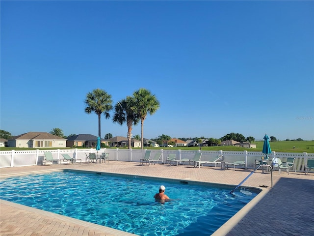 17108 SE 111th Terrace Rd, Summerfield, FL 34491 - community pool featuring a patio and a residential view