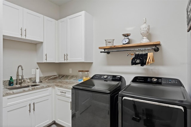 9512 Mid Summer Ln, Leesburg, FL 34788 - laundry area with washer and dryer and cabinet space
