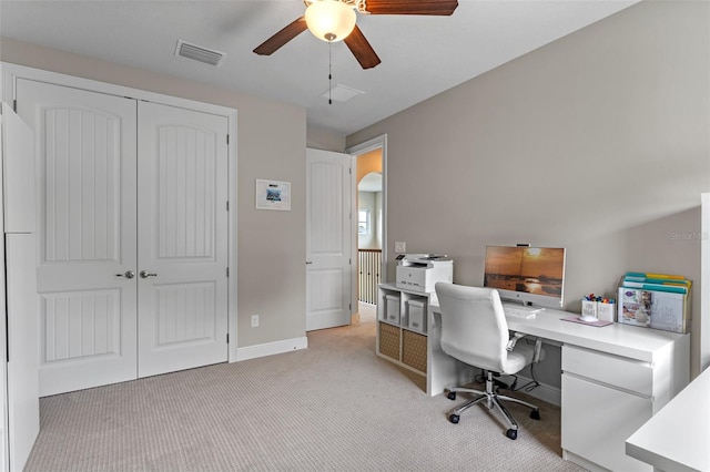 9512 Mid Summer Ln, Leesburg, FL 34788 - home office featuring light carpet, ceiling fan, and baseboards