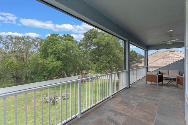 9512 Mid Summer Ln, Leesburg, FL 34788 - sunroom / solarium featuring ceiling fan and an outdoor living space