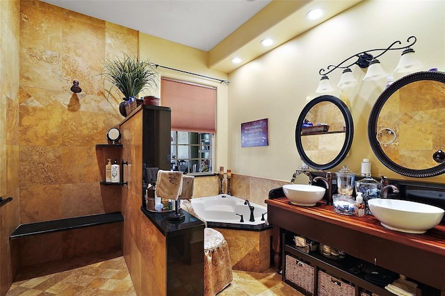 707 S Dixie Dr, Howey In The Hills, FL 34737 - full bath with a bath, double vanity, recessed lighting, and stone finish flooring