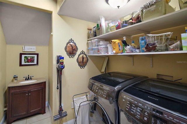 707 S Dixie Dr, Howey In The Hills, FL 34737 - washroom with washer and dryer, cabinet space, light tile patterned floors, and baseboards