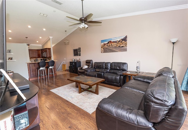 5437 Compass Pt Unit 00, Oxford, FL 34484 - living room featuring wood finished floors, ornamental molding, a ceiling fan, vaulted ceiling, and recessed lighting