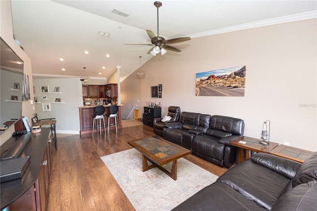 5437 Compass Pt Unit 00, Oxford, FL 34484 - living room with dark wood-type flooring, ornamental molding, ceiling fan, lofted ceiling, and recessed lighting