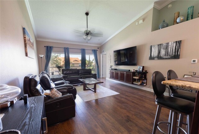 5437 Compass Pt Unit 00, Oxford, FL 34484 - living area featuring a ceiling fan, ornamental molding, dark wood-style flooring, vaulted ceiling, and baseboards