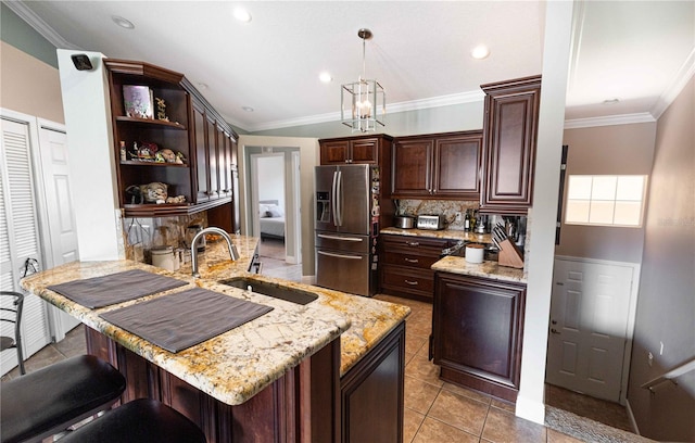 5437 Compass Pt Unit 00, Oxford, FL 34484 - kitchen with stainless steel refrigerator with ice dispenser, a sink, open shelves, a peninsula, and dark brown cabinetry