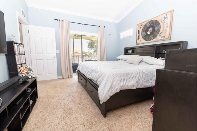 5437 Compass Pt Unit 00, Oxford, FL 34484 - bedroom featuring access to outside, vaulted ceiling, crown molding, and light carpet