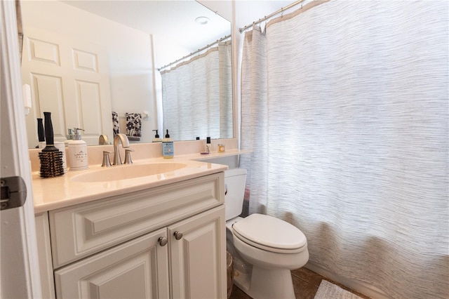 5437 Compass Pt Unit 00, Oxford, FL 34484 - bathroom featuring toilet, vanity, tile patterned flooring, and curtained shower